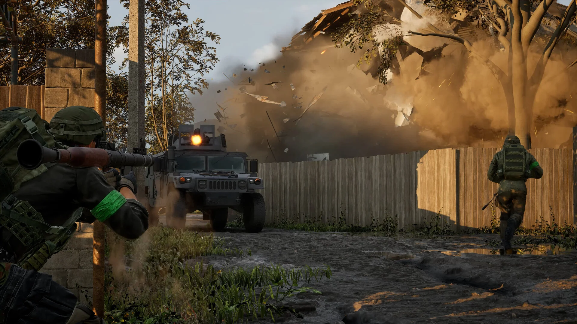 A WARDOGS squad and armoured vehicle advance as a building collapses in a cloud of dust.